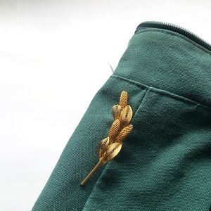 Cattail brooch